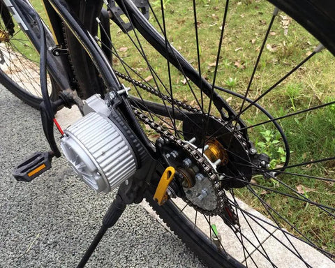 Close-up of bike wheel featuring Bike Spoke Chain Wheel And Rear Sprocket Kit 32T With 16T Freewheel Adapter For Left Drive Motor MY1016Z.