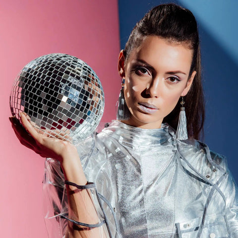 Person holding disco ball, wearing metallic outfit, showcasing Self Adhesive Disco Mirror Mosaic Tiles For DIY Craft Projects Silver 5x5mm