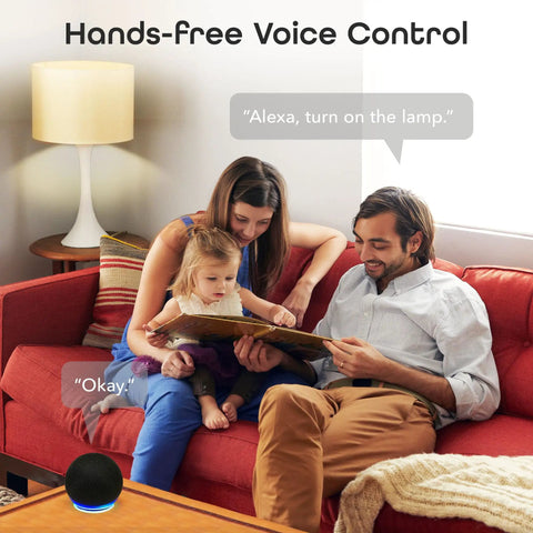 Family using hands-free voice control with smart speaker on table, reading together on red couch, natural home setting.