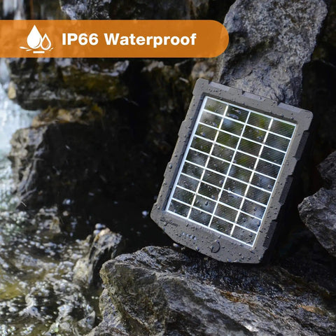 Trail Cam Solar Panel Kit Built In 2000mAh Battery For 12V 1A Or 6V 1.5A Chargers IP66 Waterproof outdoor use on rocks.
