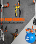 Heavy Duty Garage Storage Hooks 2 Pack Wall Mount Tool Organizer holding pliers, wrench, and a kettlebell on a grey wall