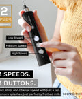 Person holding a handheld USB C rechargeable milk frother with 3 speed settings and stainless steel double whisk, black mini electric stirrer