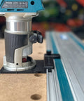 Killer Precision Router Guide Rail Adapter For Makita Tools With Onboard Rail Stop on wood surface for precise cuts.