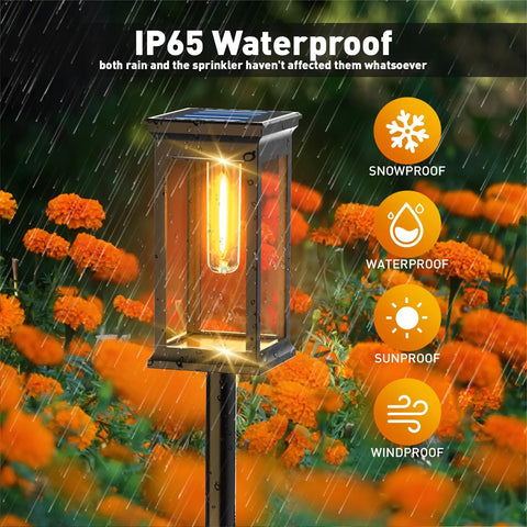 Rectangle Solar Pathway Lights Outdoor 6 Pack Super Bright Auto On Off No Fuss Landscape LED Lights For Walkway Garden And Driveway 10 Hours Run Time Weatherproof Solar Landscape Lighting illuminating among orange flowers in the rain.