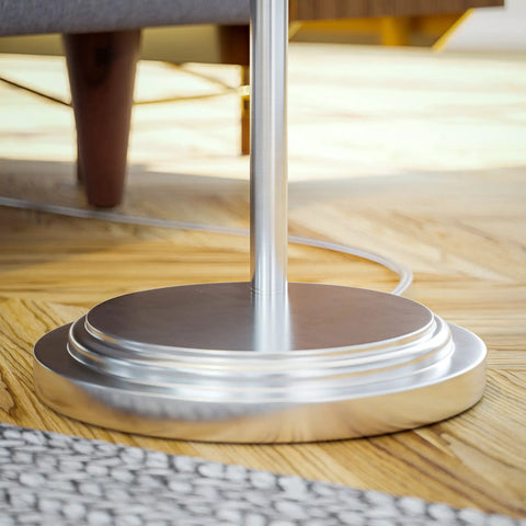 Base of Theta Swing Arm Floor Lamp With Brushed Steel Finish, modern reading light for living room or bedroom, close-up view