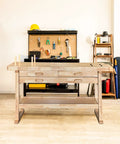 60 Inch Rubber Wood Workbench With Four Drawers Heavy Duty Portable Wood Work Table For Garage Workshop And Home Storage Supports Up To 450 Lbs in a garage setting.
