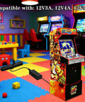 12V Power Supply Charger for Arcade Game Machines plugged into arcade cabinet in colorful game room