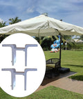 2 Pieces Wall Mounted Brackets For Retractable Awnings Aluminum Alloy Outdoor Shade Canopy Fittings And Heavy Duty Support Hardware Replacement For Backyard Court White, shown with outdoor umbrella setup in garden.