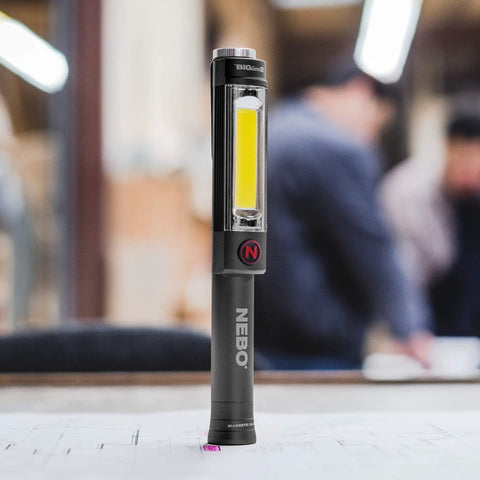 Big Larry 2 Work Light With 500 Lumens Magnetic LED Flashlight And Portable COB Task Lamp on table in workshop