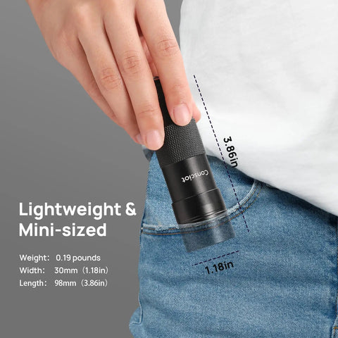 Person placing UV Flashlight Black Light 12 LED 395nm Ultraviolet Detector into pocket, showing compact size and lightweight design