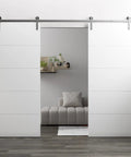 Double Barn Door Set 84 By 96 Inches With 14 Foot Brushed Nickel Rail Kit installed in a modern living room with sliding feature.