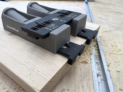 Twin Pocket Hole Jig Set With Adjustable Base And Magnetic Quick Adjust System for woodworking joints on a workbench