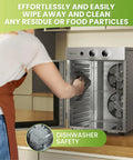 User cleaning the inside of the Top Shelf Food Dehydrator Machine With Twelve Stainless Steel Trays and Digital Timer.