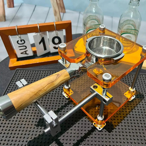 Straight Up Espresso Tamping Station For Home Baristas, 58mm Acrylic Portafilter Holder close-up with adjustable rod and wood handle.