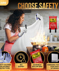 Woman using Must Have Emergency Fire Blanket 40 By 40 Inches Pack Of 2 With Hooks And Gloves to smother flames in kitchen.