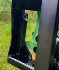 Close-up of Dual Mount Tractor Pallet Forks For Front End Loader And 3 Point Hitch With 2 Inch Receiver Chain Hooks