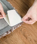 Applying Vacuum Tech Rug Pad Gripper For Hardwood Floors No Damage, Non Slip Under Rug Tape with corner flat on wood floor