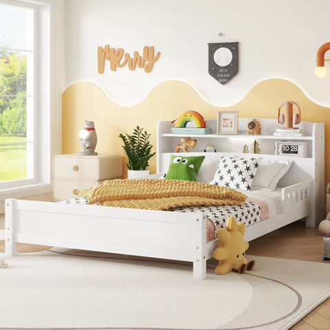 Solid Pine Wood Full Bed With Built In Bookcase Headboard LED Motion Sensor Night Light White Finish And Flexible Guardrails For Safe Sleep Perfect For Kids And Guest Rooms, displayed in a bright room with toys.