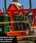 Rear view of six in one tractor attachment with headache rack and utility mount on green tractor