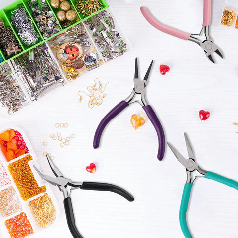 4 Piece Jewelry Pliers Set For Beading And Jewelry Making Including Needle Nose Pliers, Round Nose Pliers, Bent Nose Pliers And Wire Cutter Handy Tools Kit For Bracelet Craft, Wire Wrapping, And DIY Jewelry on tabletop with beads