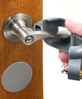 Doorknob Lock-Out Device With Key Blocks Access To The Keyhole On Round Knobs Up To Two And Seven Eighths Inches being installed