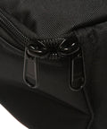 Close-up of a zipper on the Compact Scuba Diving Regulator Bag For Travel With Durable Exterior Detachable Shoulder Strap Suitcase Style Buckle Interior Hook And Loop Straps And Transparent Document Pocket For Gear Protection