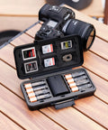 All In One Camera Battery And Memory Card Storage Case For Pro Gear With Six SD Card Slots, batteries on wooden table
