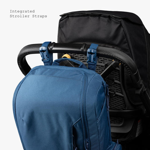 Dad Friendly Diaper Bag Backpack With Dual Compartments And Removable Cooler attached to stroller