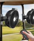 Keep Your Cart Fresh With This Rock Solid Two Pack Eight Inch Magnetic Golf Cart Fan Featuring A Heavy Duty Strap Bright Lighting And Epic 12000 Mah Battery mounted on a golf cart, showing remote control.