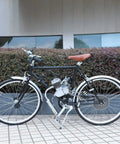 Motorized bicycle equipped with a 2-stroke engine and Beefed Up Chain Tensioner And Arch Idler Kit For Motorized Bicycles