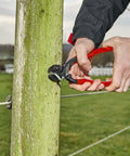 Person using CoBolt Compact Bolt Cutter 10 Inch Ultra High Leverage Tool Delivers Sixty Percent Less Effort With Induction Hardened Cutting Edges at 64 HRC