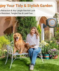 Woman with dog in garden, Retractable Garden Hose Reel With Auto Retraction, 5/8 Inch By 100 Foot Hose, Wall Mount visible on wall.