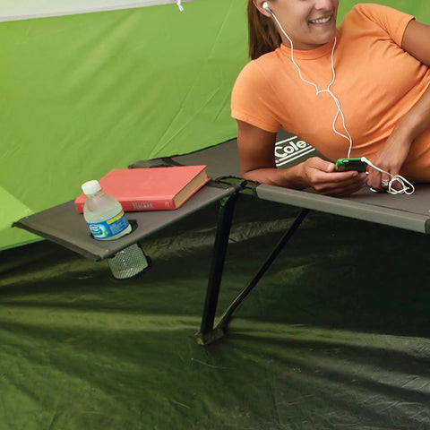 Pack-Away Big N Tall Camping Cot With Removable Side Table And Cup Holder, person lounging with book and bottle beside