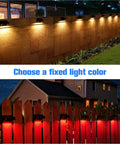 8 Color Solar Fence Lights Kit With 4 Modes illuminating backyard fence in warm and red tones, outdoor wall lighting shown at night