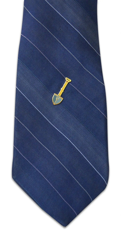 Straight Up Sweet Spring Gardening Enamel Lapel Pin Set For Suit Jacket And Necktie Three Piece Spade Shovel Hat Pin Kit With Secure Clutch Backs For Green Thumbs on a blue striped necktie.