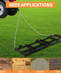 Beefy 6Ft Drag Harrow For ATV UTV Tractor Driveway And Lawn Leveling Rake attached to a tractor on grassy field