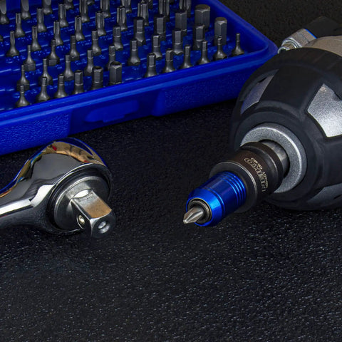 Impact Wrench Adapter One Half Inch Drive To One Quarter Inch Hex Converter with Quick Change Chuck and tool set on black surface