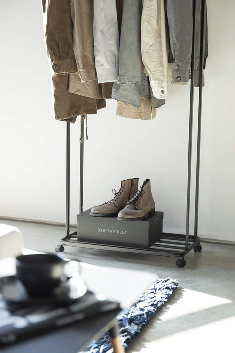 Kickass Rolling Wardrobe Rack With Staggered Wooden Bars And Roomy Bottom Shelf Built Tough With Steel Frames Delivers The Ultimate Flex For Portable Closet Setup Anywhere Glides On Smooth Casters