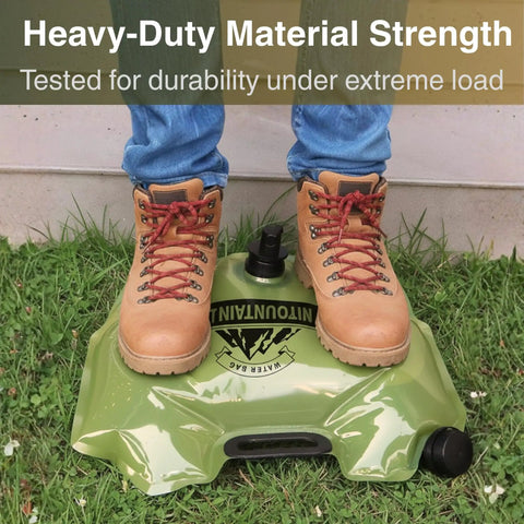 Person standing on Two Gallon Collapsible Water Container With Spout For Camping And Outdoors Ready Grab And Go Reusable Plastic Water Storage Jug Foldable Empty Gallon Water Bag For Hiking Emergency Prep Lightweight Portable Water Storage Solution to show durability