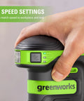 Hand adjusting speed setting on Cordless 24V 5-Inch Random Orbital Sander Kit With Variable Speed, 2Ah Battery And Charger Included