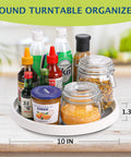 Set Of 4 10 Inch Rotating Lazy Susan Organizer With Non Skid Beaded Surface holding condiments and spices on a countertop.