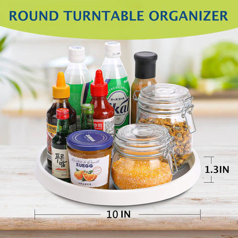 Set Of 4 10 Inch Rotating Lazy Susan Organizer With Non Skid Beaded Surface holding condiments and spices on a countertop.
