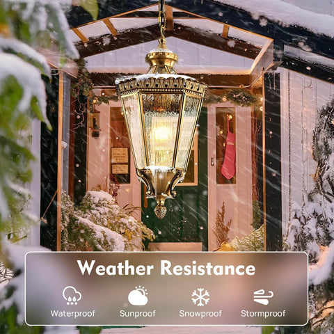 Copper Outdoor Pendant Light With Waterproof Anti Rust Finish hanging outside a porch, illuminated with snow falling.