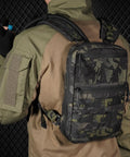 Person wearing Tactical Molle Hydration Pack One And A Half Liter Capacity Water Reservoir Bag For Molle Vest Backpack Lightweight Durable
