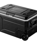 Massive 69 Quart 12V Portable Refrigerator And Freezer Cart Riding On Tough Off Road Wheels With Separate Food Zones Built Straight For Weekend Warriors And Backroad Adventure Crews, durable black cooler.
