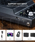 Close-up of Portable 20W Rechargeable Guitar Amp with Distortion and Delay Effects showing AUX input and controls with icons.
