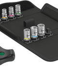 Open case of the Kraftform Kompakt 400 RA 9 Piece T Handle Ratchet Screwdriver Set 2 with Nut Adapters in a black holder.