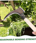 Multipurpose Manganese Weeding Scythe With Comfortable Handle shown cutting grass in garden.