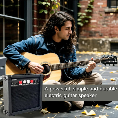 Musician playing acoustic guitar outdoors near 20 Watt Portable Electric Guitar Amp With Headphone Input And Aux Phone Audio Link