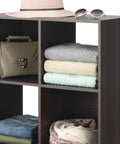 Six Cube Storage Organizer With Three Tier Stackable MDF Wood Bookcase Open Display Shelves For Living Room Bedroom And Home Office Perfect For Books Toys And All Your Stuff Espresso Finish featuring folded clothes, purse, and hat.